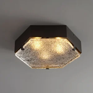 Antheron modern hexagonal ceiling lamp illuminated close-up with three lit bulbs textured glass diffuser