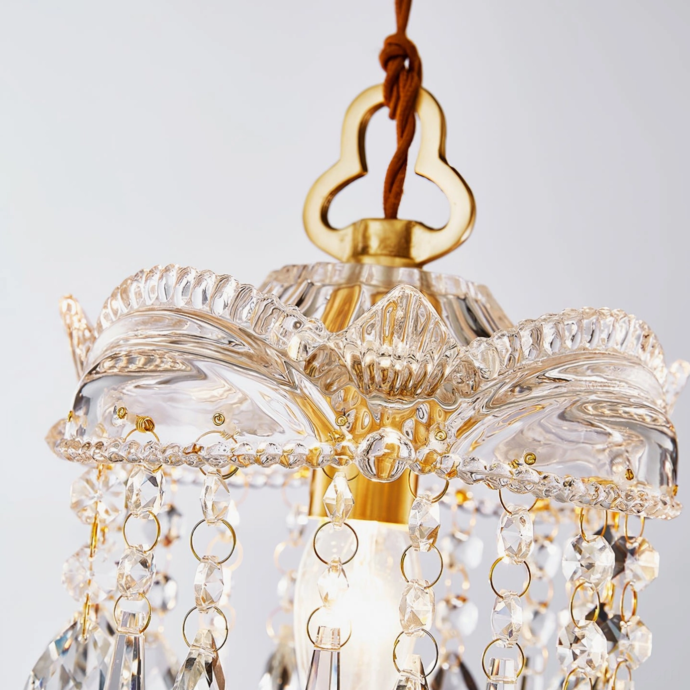 Vintage brass ceiling hook and carved glass shade with beaded crystal trim, chandelier top assembly