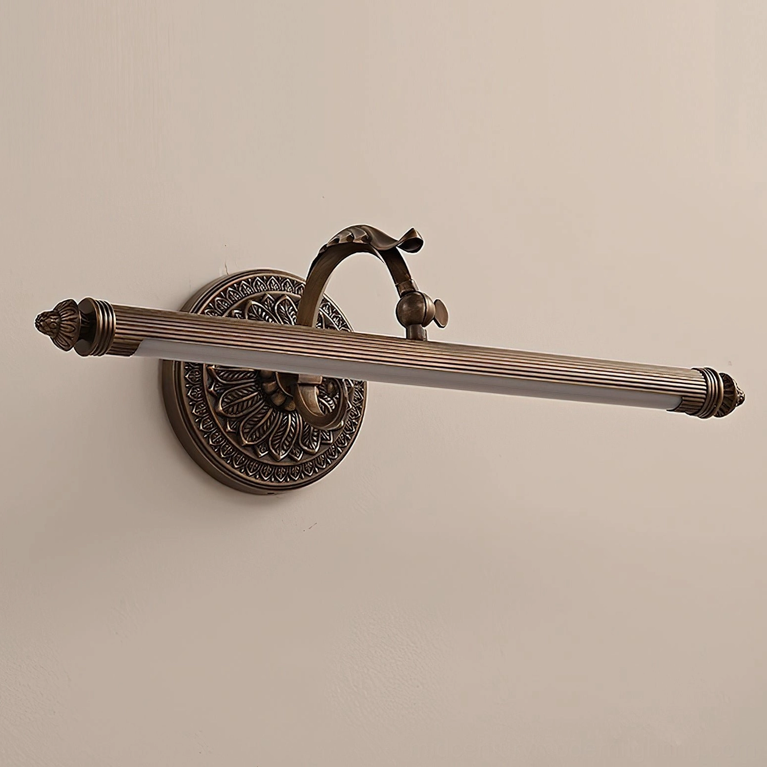 Ellesmere antique brass wall sconce styled with transitional decor and artwork display