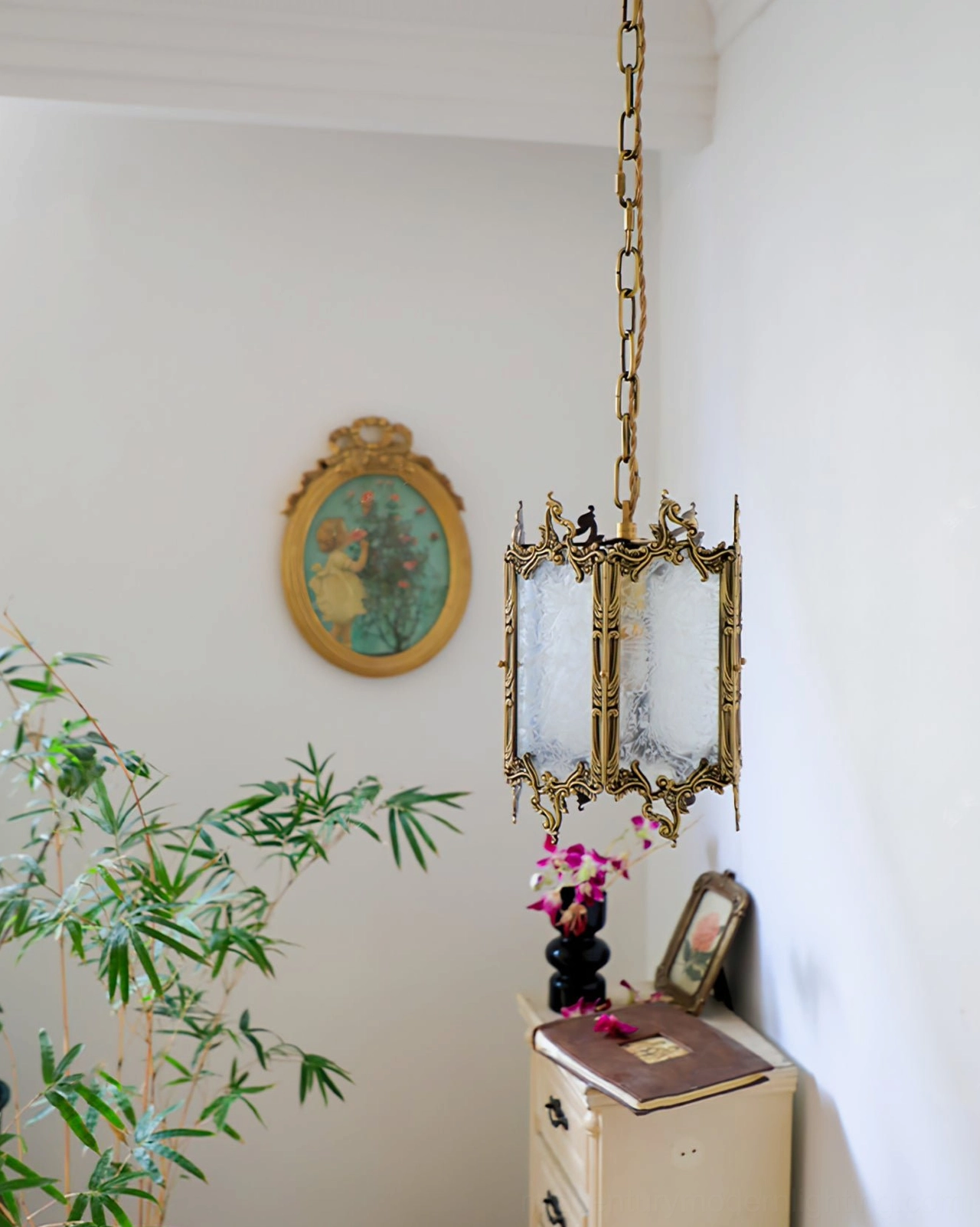 Antique brass lantern pendant rear side angle view highlighting brass finish and glass panel construction in vintage vanity nook