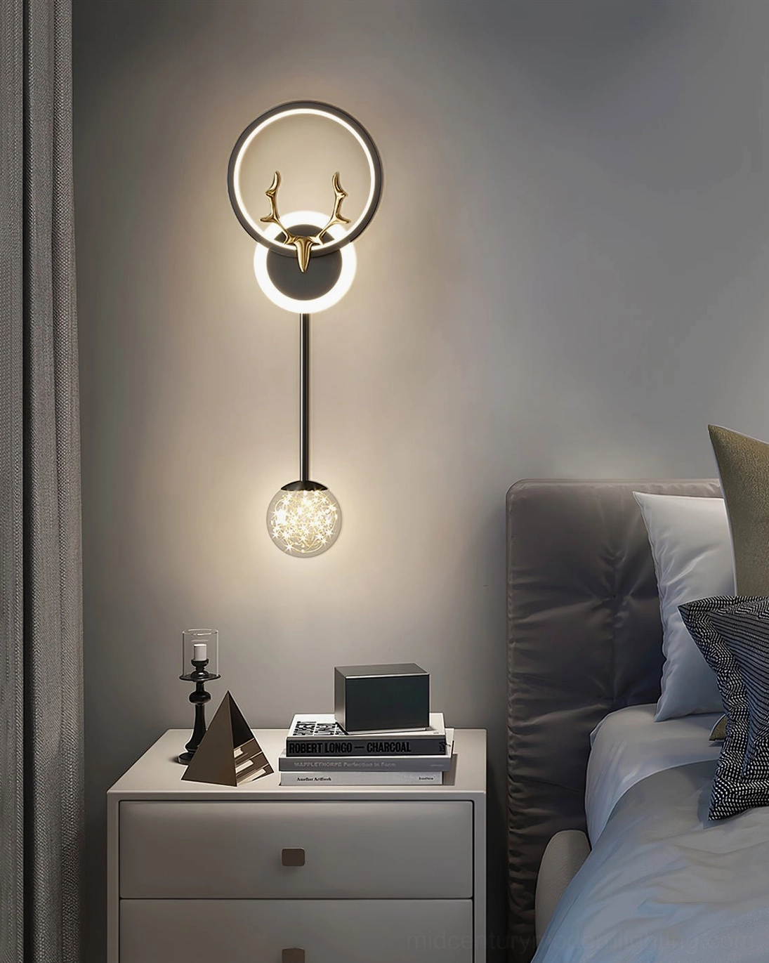 Gold and black antler wall sconce color comparison showing both finish options available