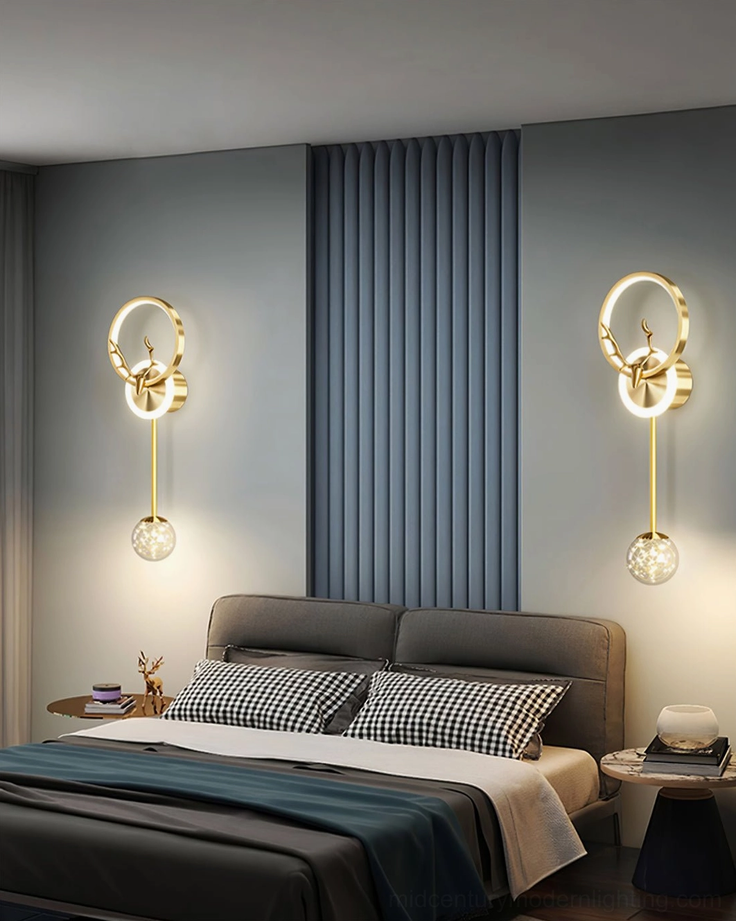 Antler wall sconce with brown leather bed in bedroom showing gold finish and natural light interaction