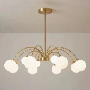 Close-up overhead view of Apiales mid-century modern chandelier showing individual glass spheres and brass arm details