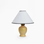 Arbol wooden table lamp with white linen shade and gray trim, full front studio view showcasing tapered fabric shade and solid wood turned base