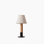 Arbor mid-century modern table lamp with natural wood base and stitched fabric shade, studio frontal view