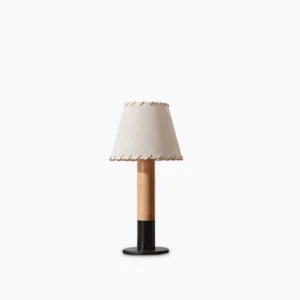 Arbor mid-century modern table lamp with natural wood base and stitched fabric shade, studio frontal view