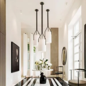 Black matte Arborescence pendant chandelier in luxury high-end residential dining room with modern interior design
