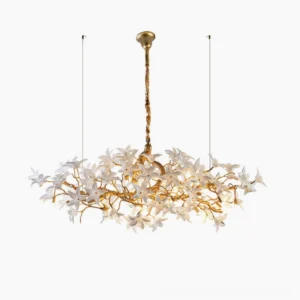 Arboris Blossom Branch hand-forged brass chandelier front view with white floral ornaments and gold branches