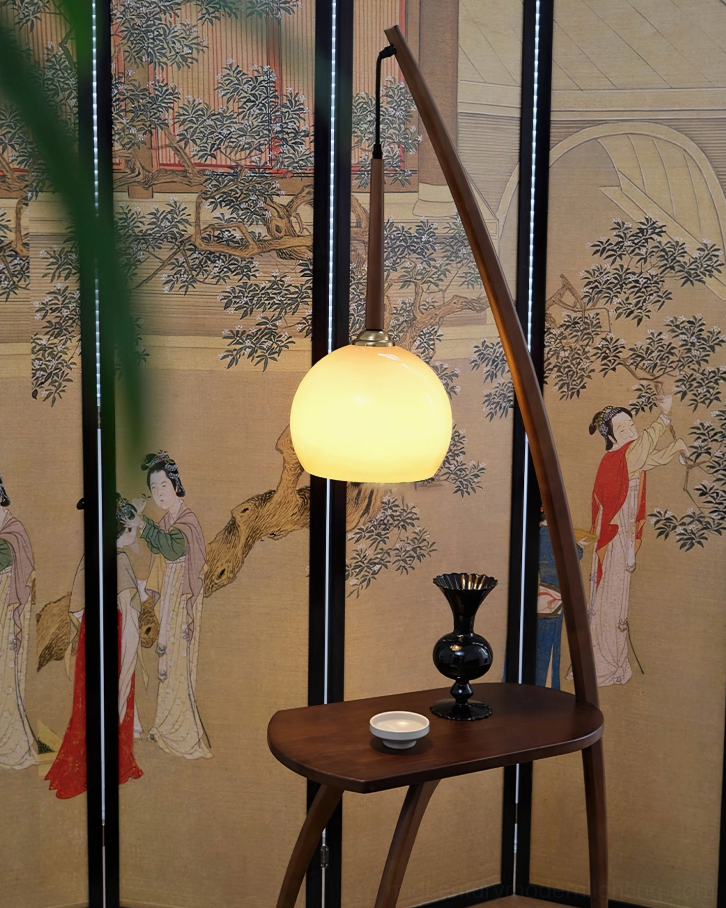 Arc floor lamp with side table detail, walnut wood construction and amber glass shade