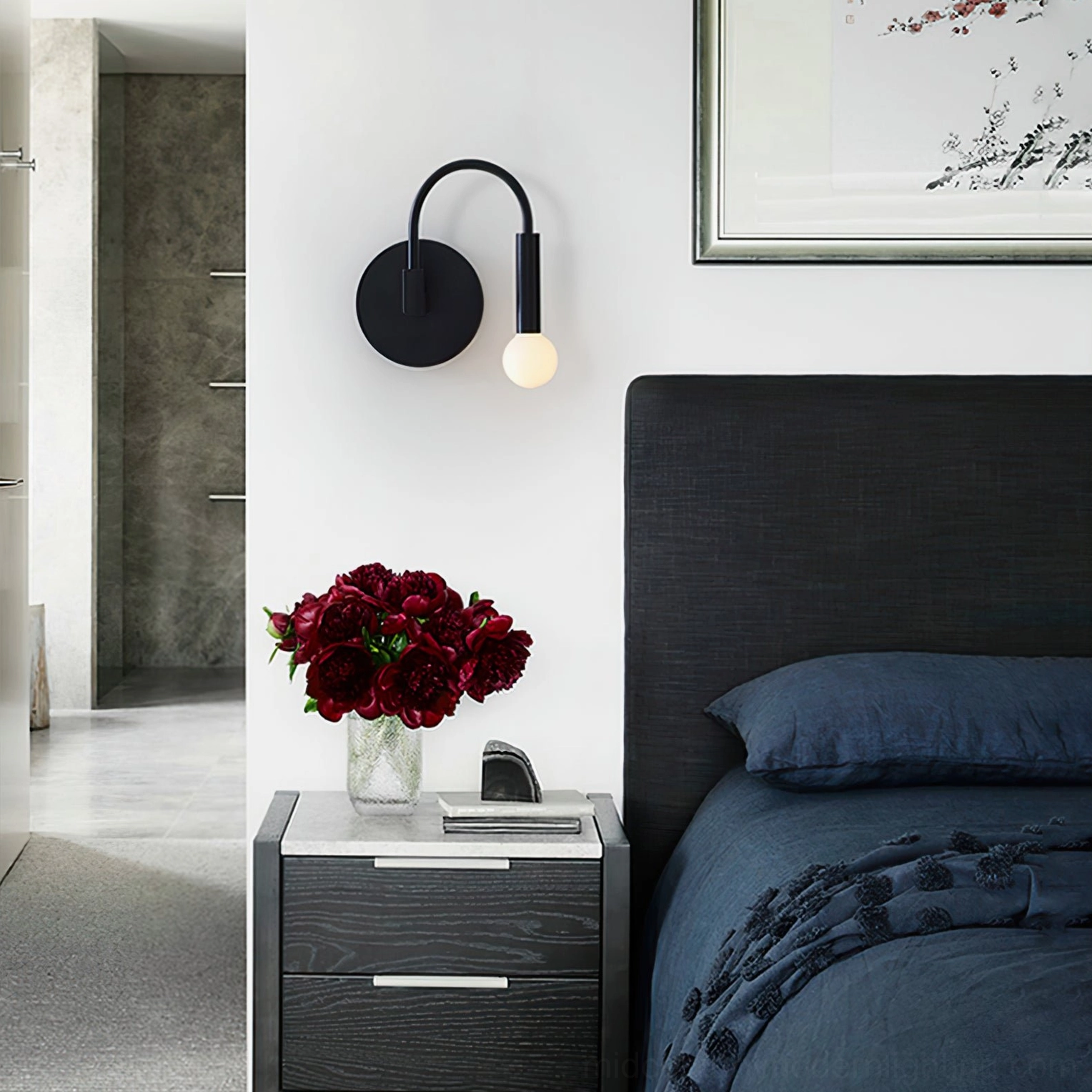 Arch wall lamp in dark fabric bedroom with decorative elements and soft illumination