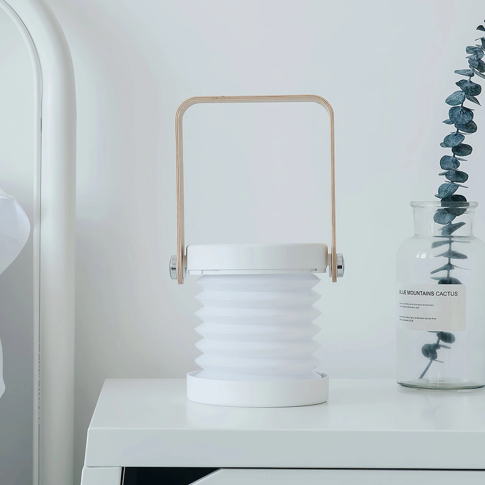 Architectural lantern lamp with touch dimmable LED, grey and wood color showing design versatility