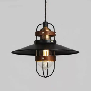 Close-up detail of Arely pendant lamp showing exposed Edison bulb, twisted black cord, and protective metal guard cage construction