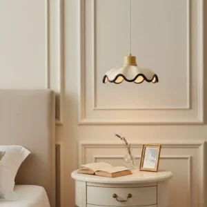 Vintage scalloped pendant light installed in French classic bedroom nightstand area