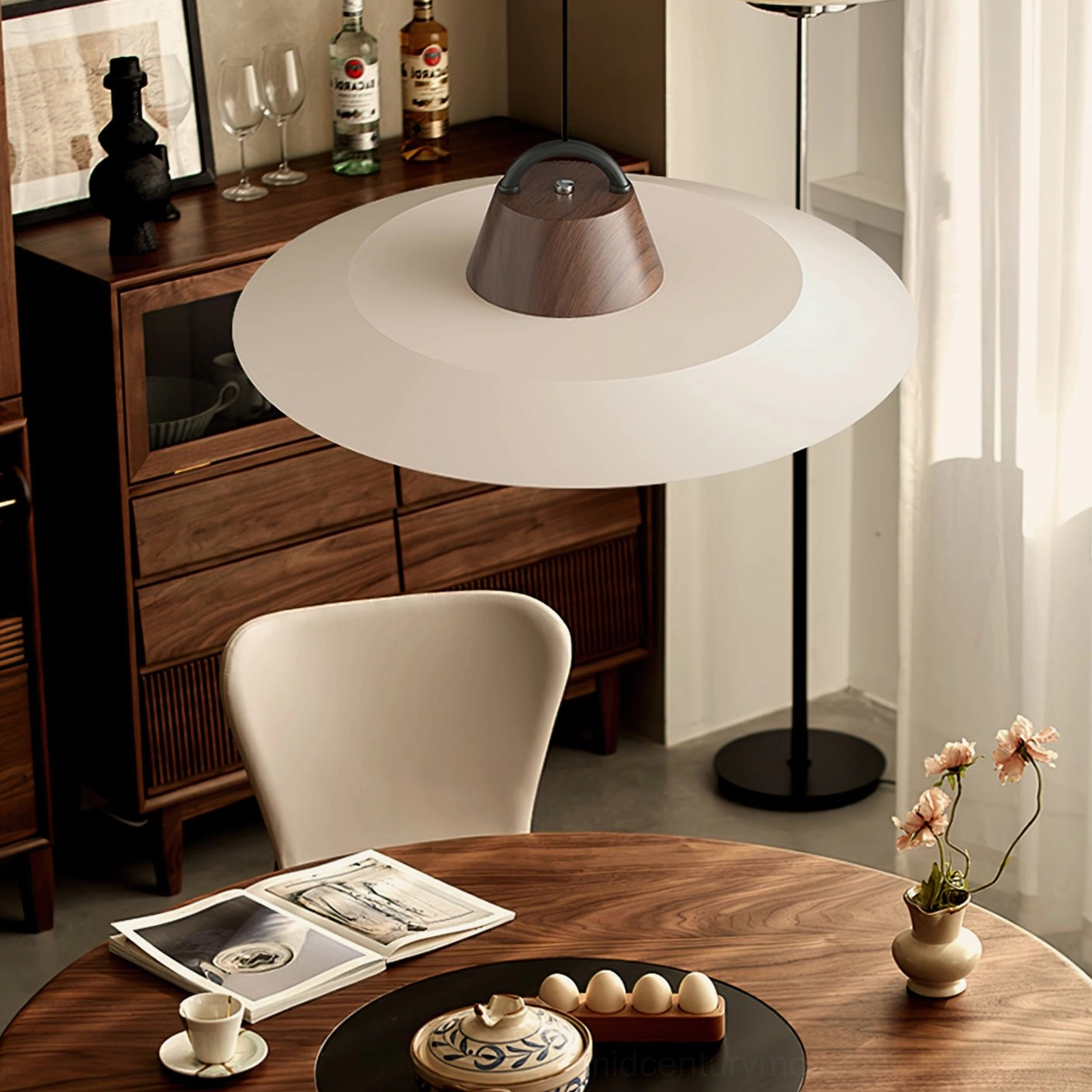 Arenal pendant in vintage dining space with wooden furniture, demonstrating mid-century modern compatibility