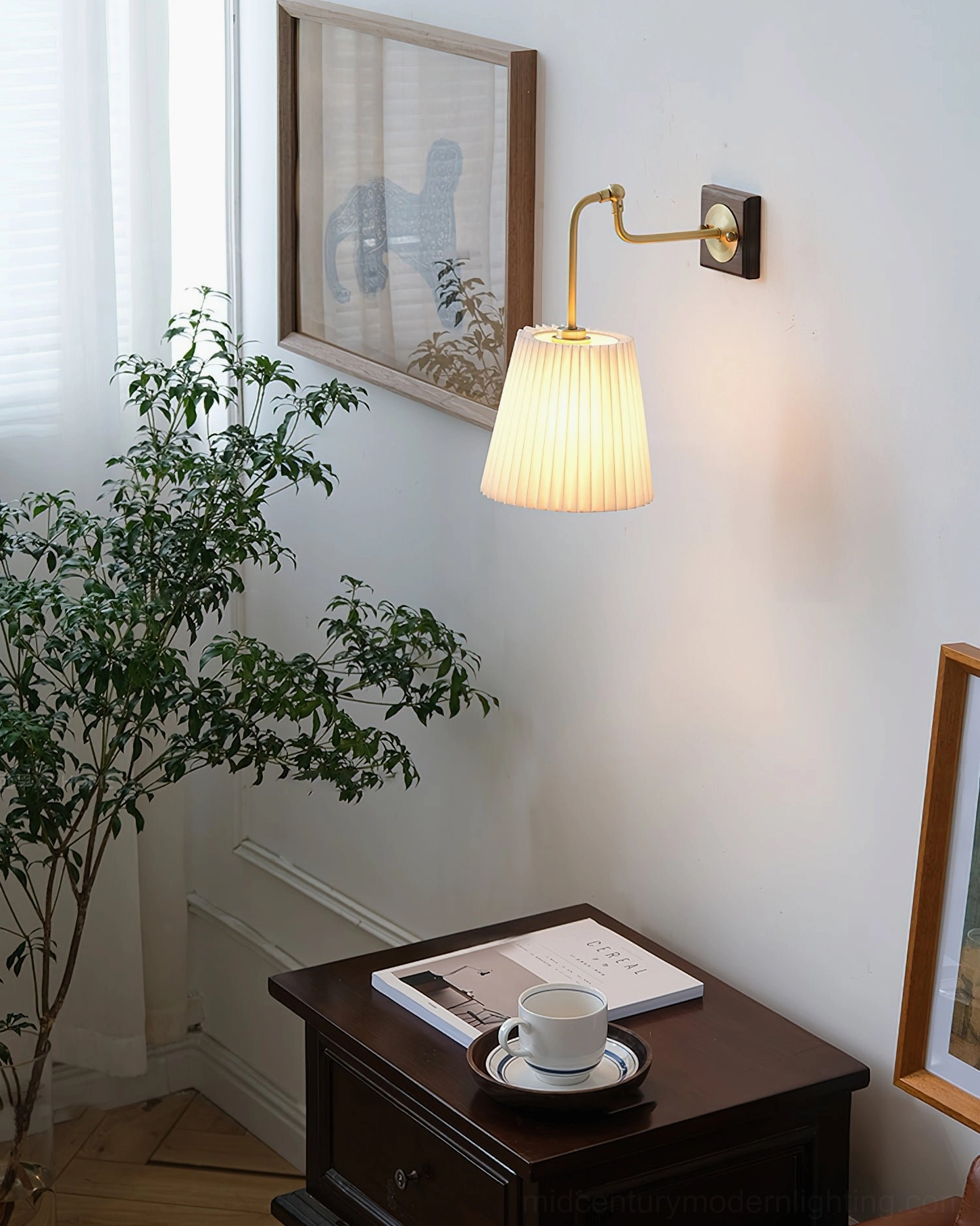 Lit Argon wall lamp in modern living room setting with warm ambient light, green plant, and side table decor