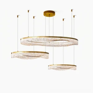 Aria three-tier modern ring chandelier with brass accents and textured resin shades overhead view