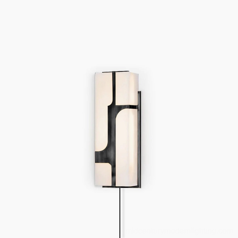 Ariel alabaster wall sconce mounted installation showing geometric brass frame design