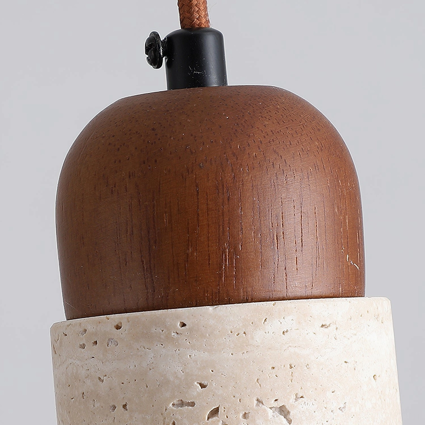 Arlene travertine pendant lamp diffusing soft warm light in modern minimalist interior