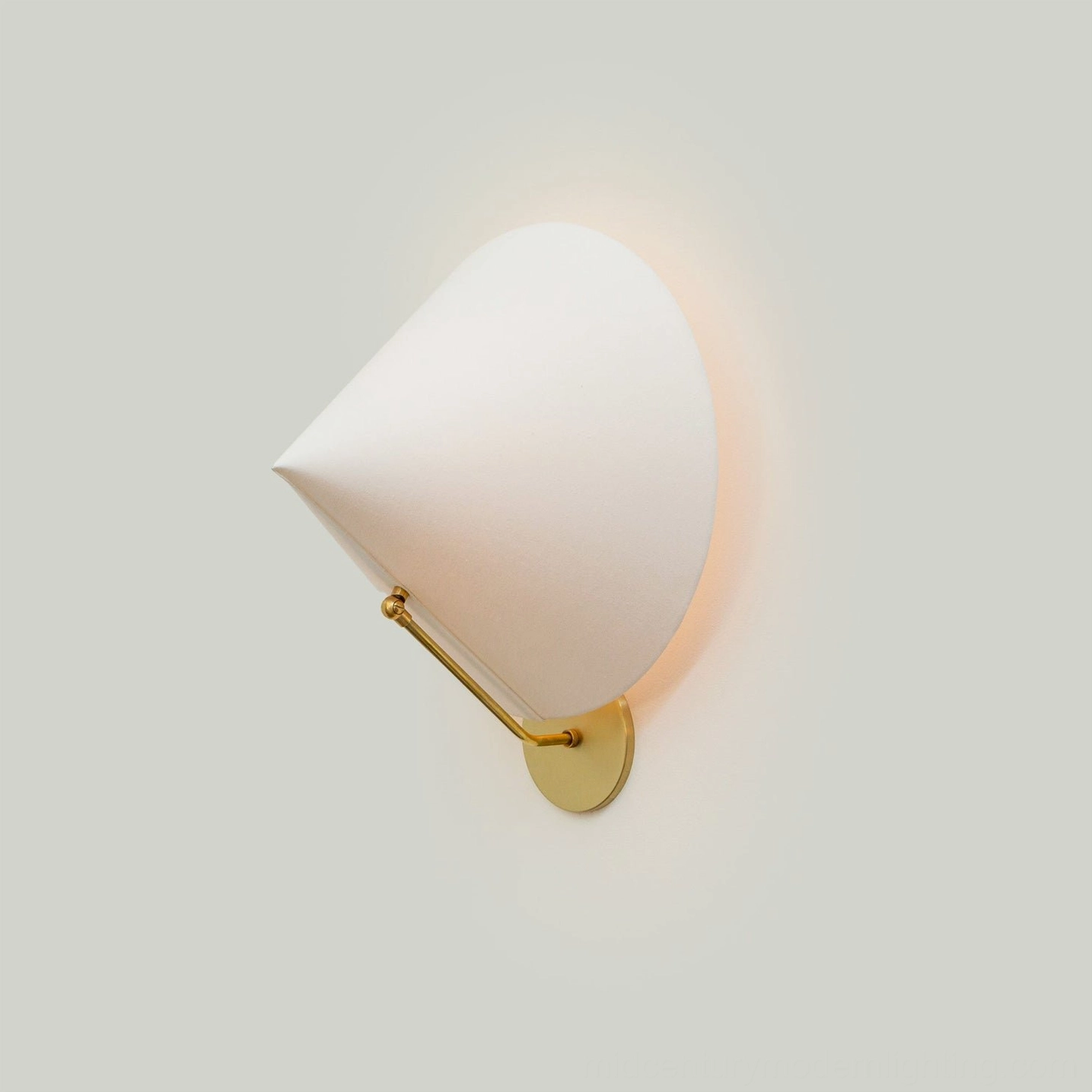 Arno conical wall sconce mounted above bedside table, mid-century modern bedroom lighting design