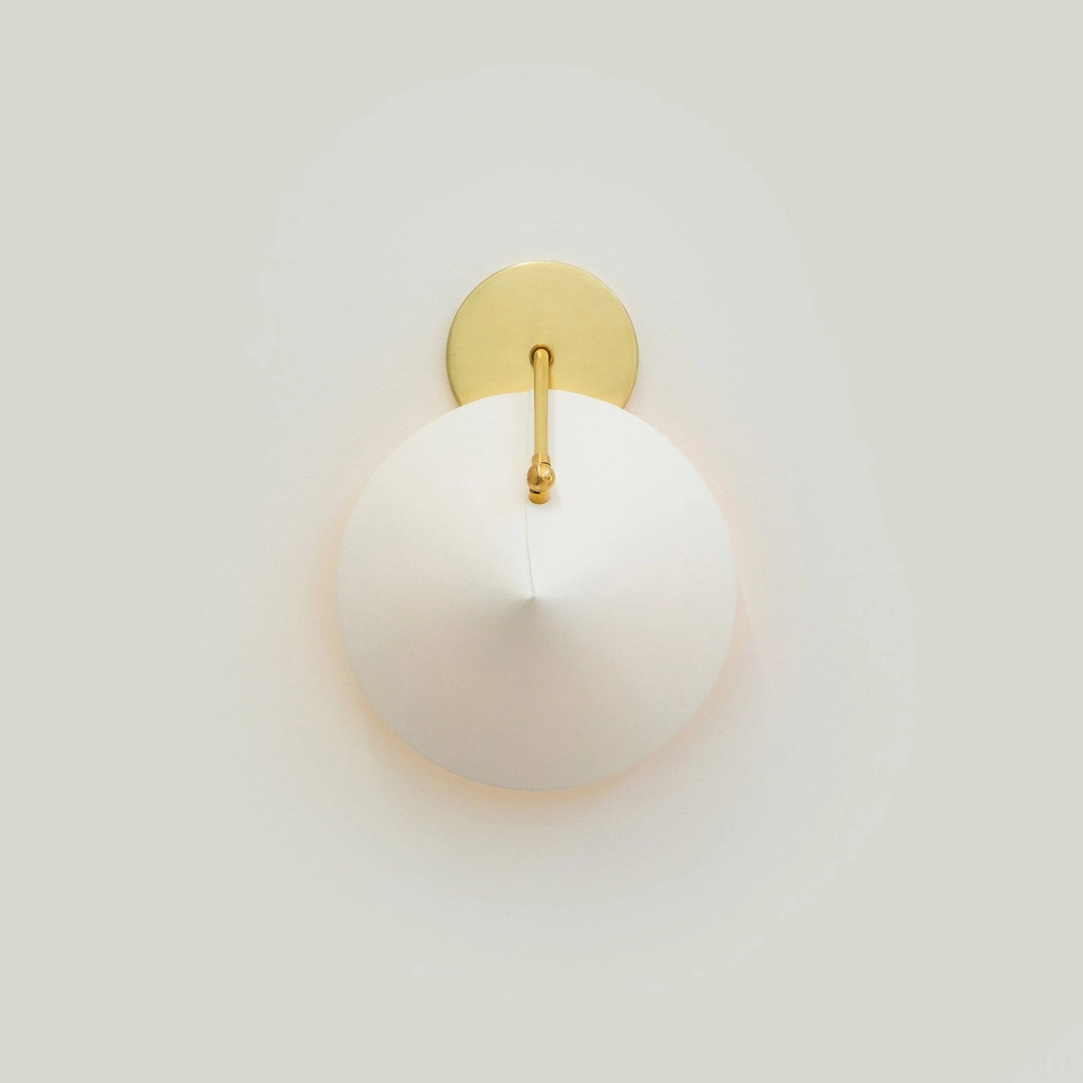 Arno mid-century modern wall light sconce, detailed close-up of brass mount and fabric shade