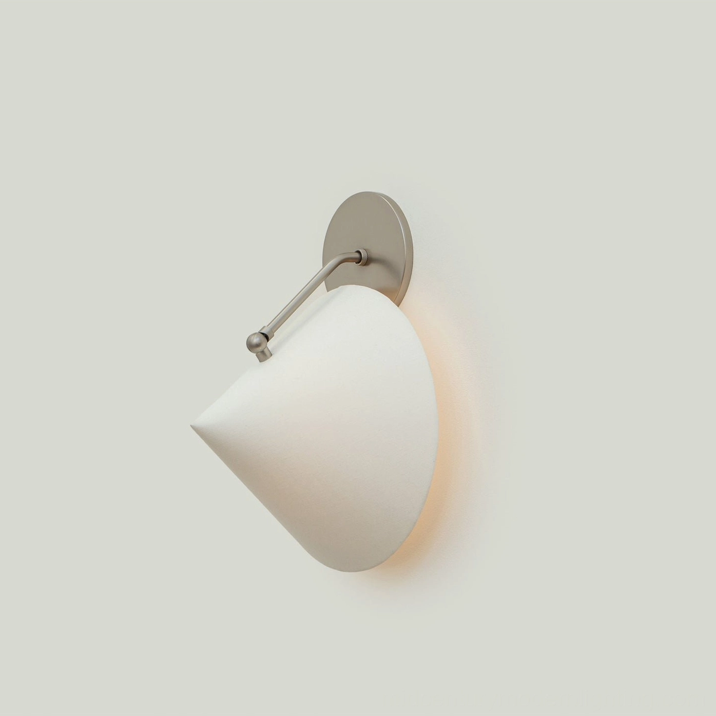 Arno conical wall sconce as gallery-style accent light above console table with artwork