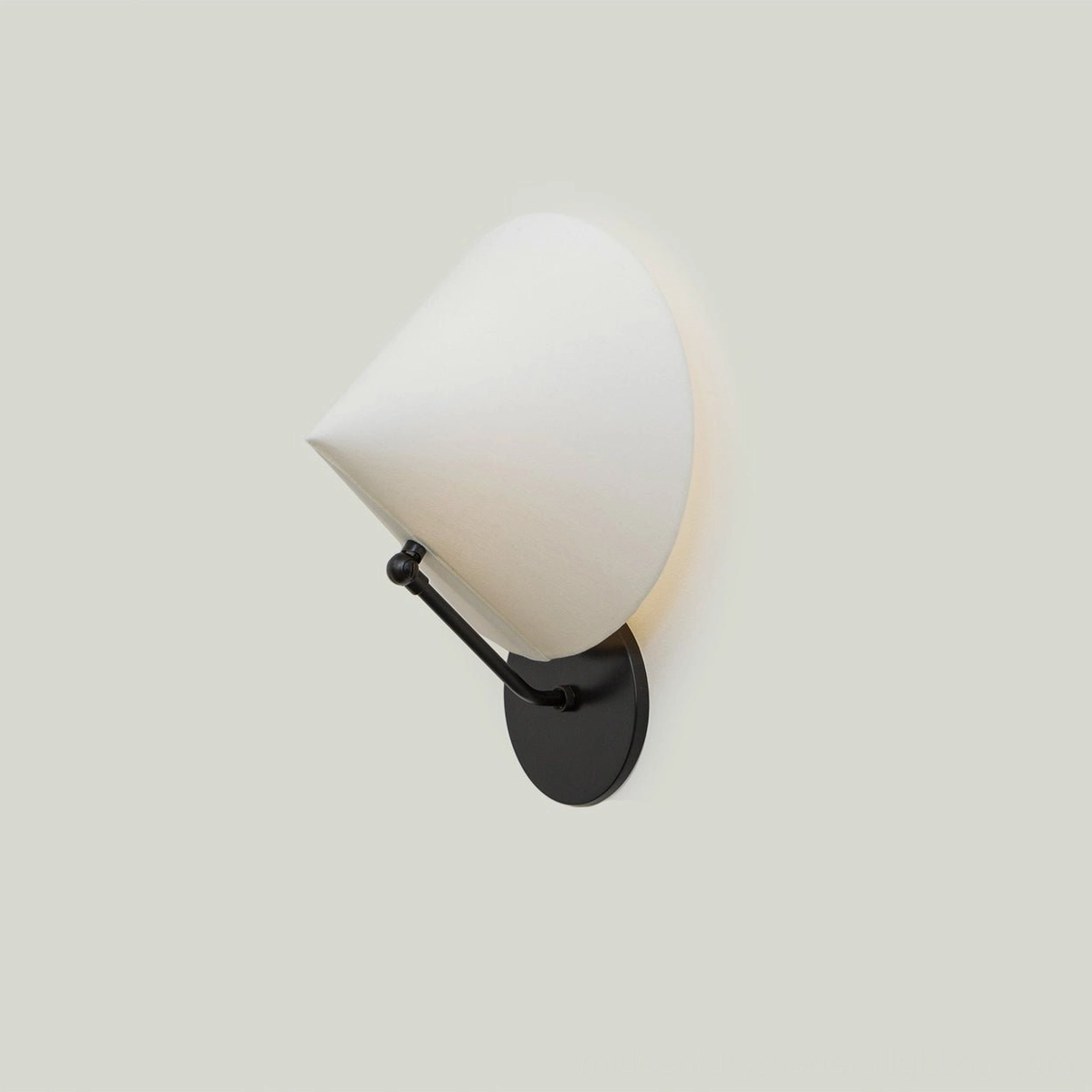 Arno wall sconce paired symmetrically in modern interior hallway, mid-century design aesthetic