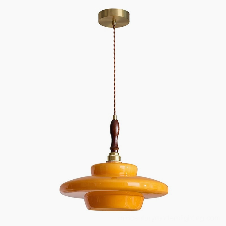 Full view of Aroma mid-century modern pendant lamp with orange amber glass and gold hardware