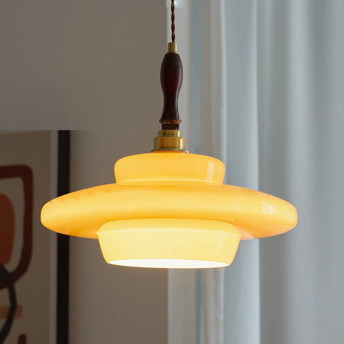 Aroma mid-century modern pendant lamp creating ambient lighting in Scandinavian inspired interior