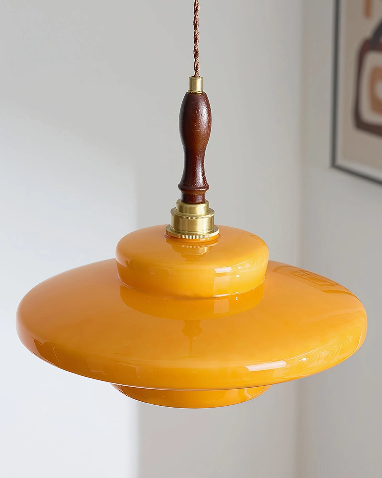 Aroma pendant lamp glossy amber glass shade with smooth finish and sculptural layered disc design