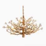 Art Deco brass gemstone branch chandelier front view studio shot with gilded metal branches and clear crystal accents