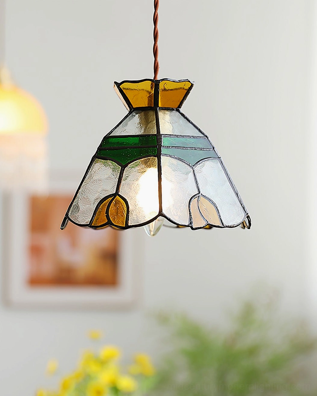 Art deco stained glass pendant lamp with twisted brown cord and scalloped brass frame