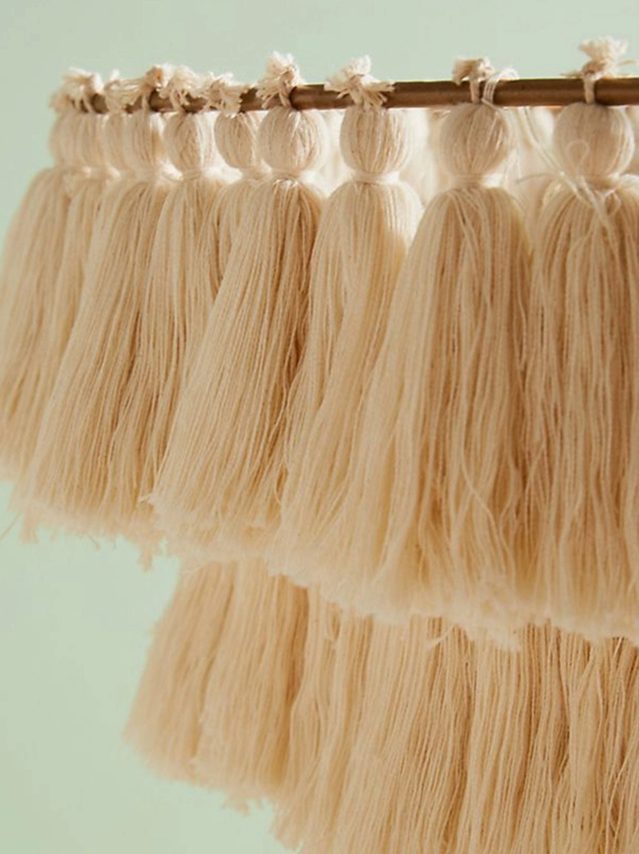 Handcrafted multicolor bohemian tassel chandelier emphasizing textile heritage and artisanal craftsmanship