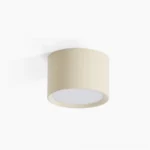 Asher flush mount ceiling light in cream, front view, minimalist cylindrical design with frosted acrylic diffuser