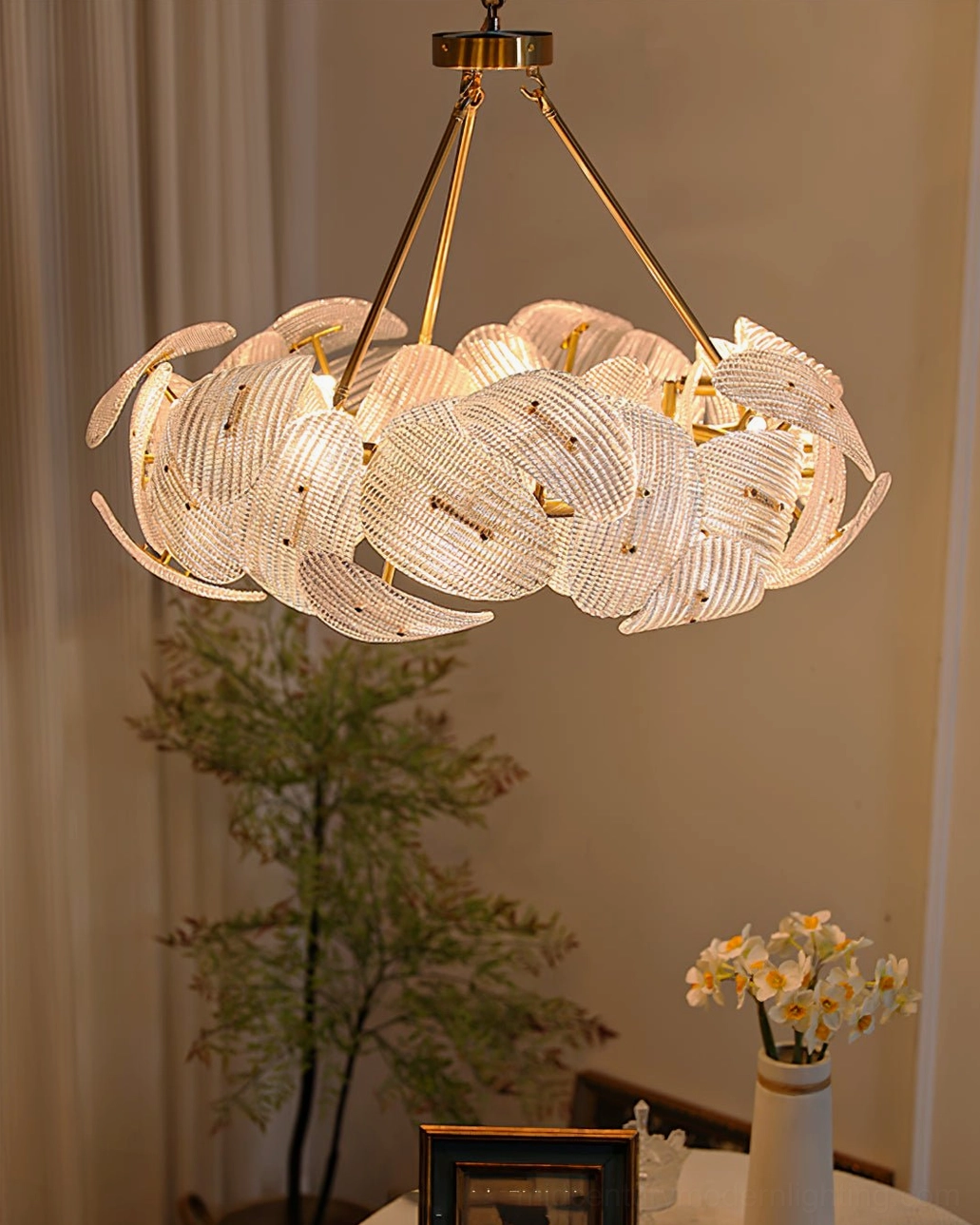 Aster gold pendant light brass frame sculptural glass shade modern design