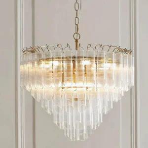 Astoria Waterfall Glass Chandelier hanging display - layered clear glass shades with warm brass suspension on interior wall