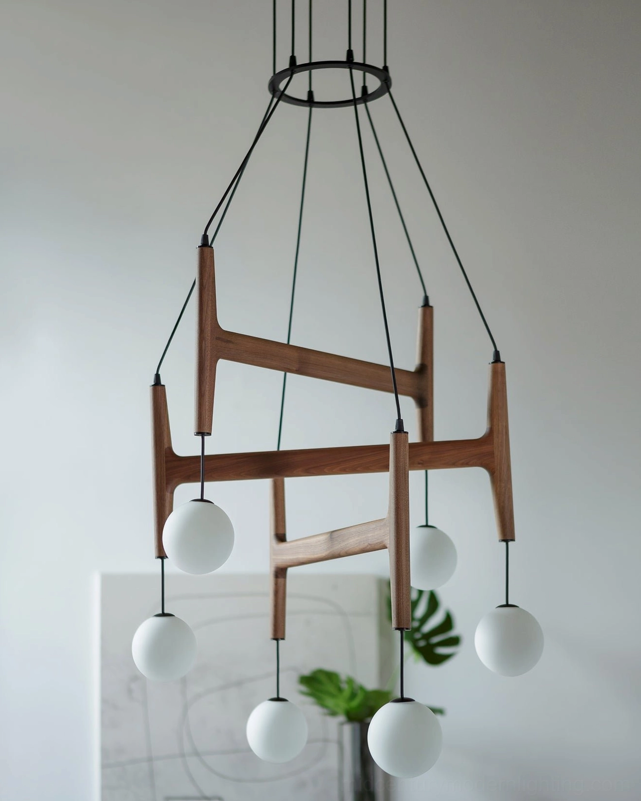 Astra wooden suspension light with frosted white glass globes and geometric frame structure