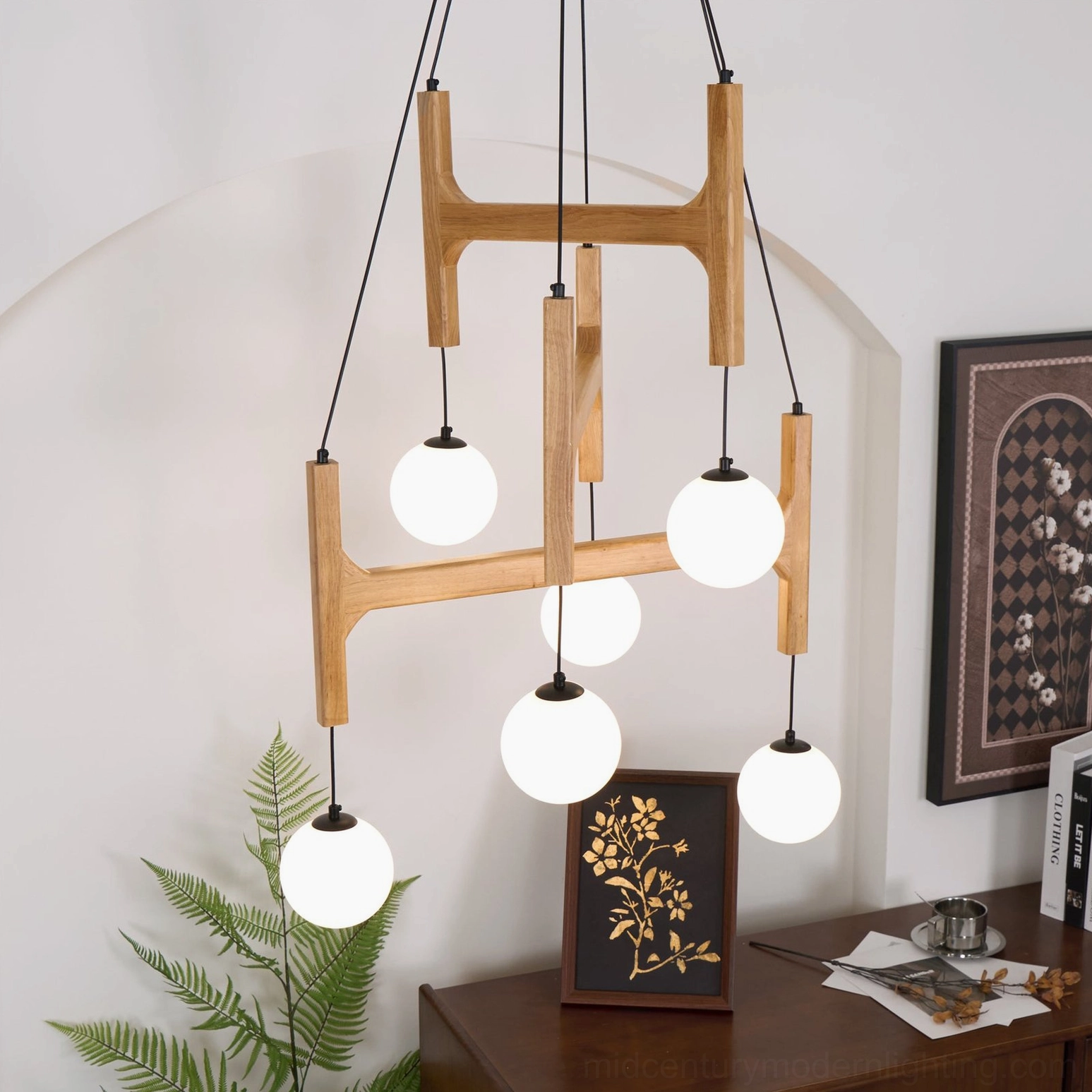 Astra wooden chandelier frame detail showing precision-cut geometric structure and metal hardware construction