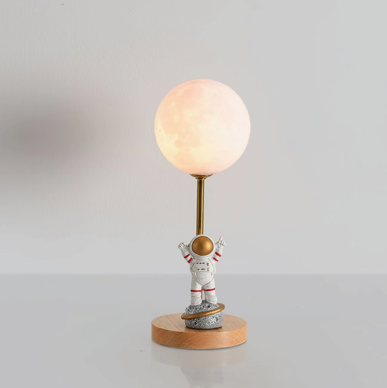 Astronaut moon lamp in living room interior showing conversation-starting accent piece design-forward home styling
