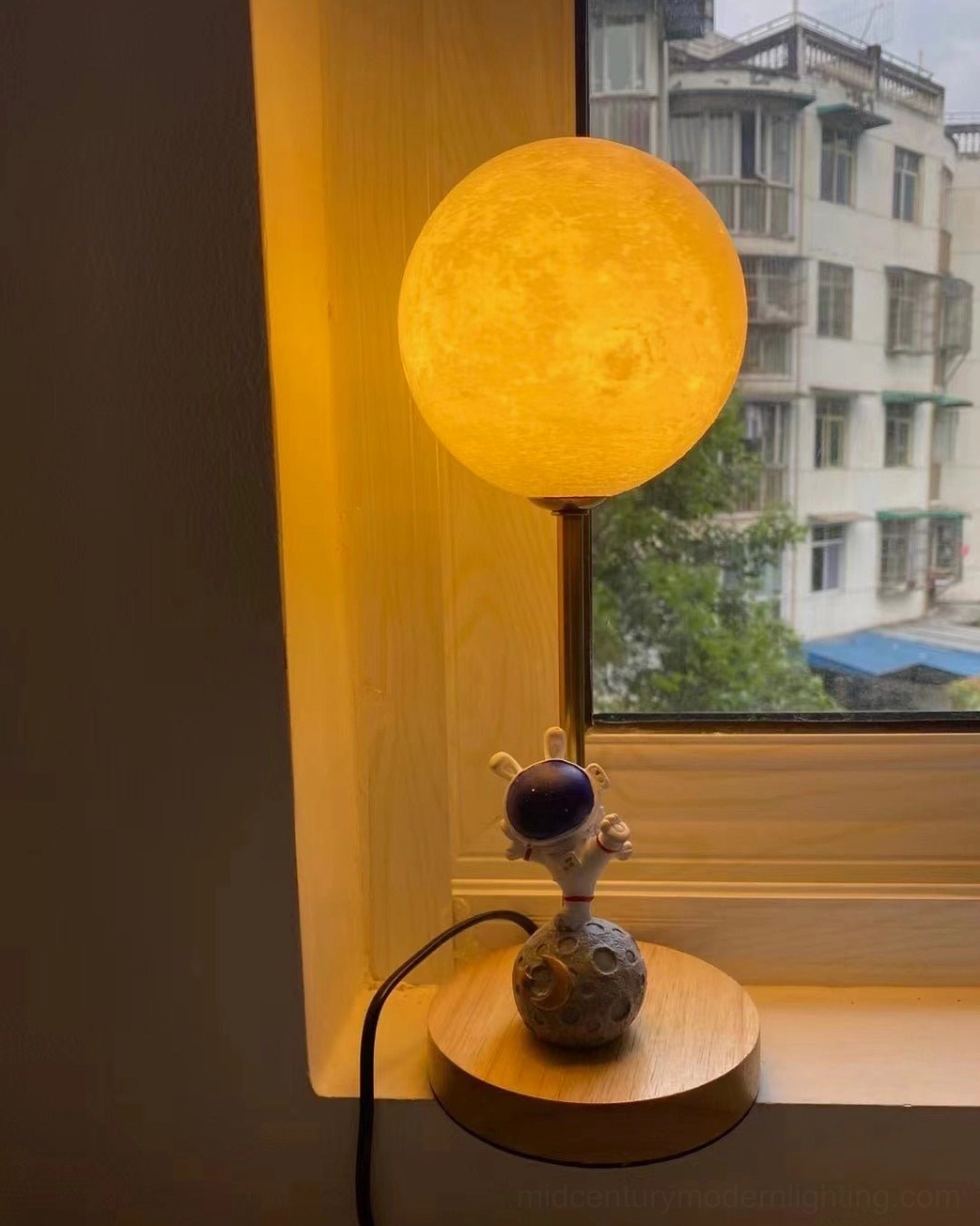 Astronaut moon table lamp material composition showing wood metal resin and PLA components closeup detail
