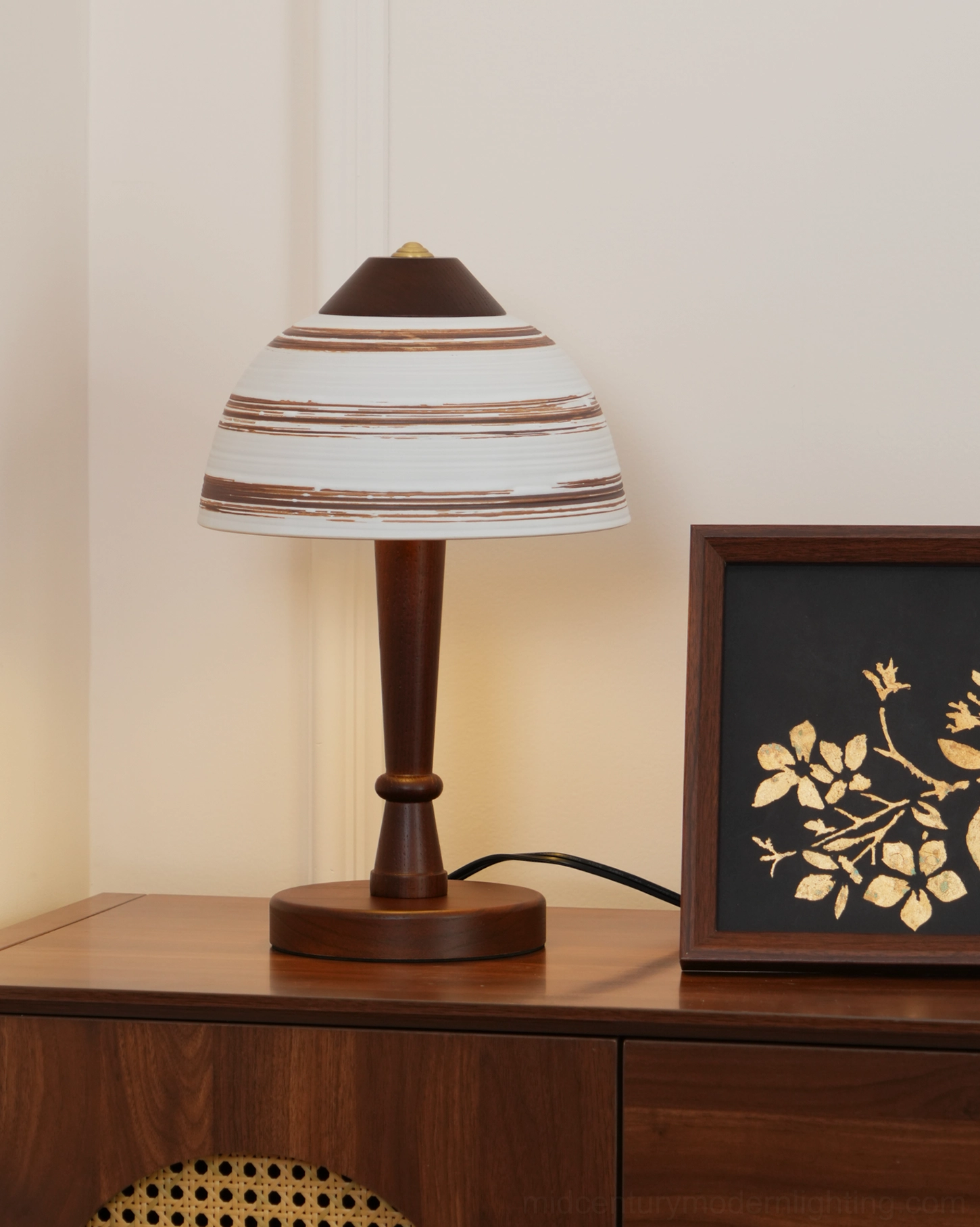 Athena modern table lamp on wooden surface showing integrated design and ceramic shade detail clarity