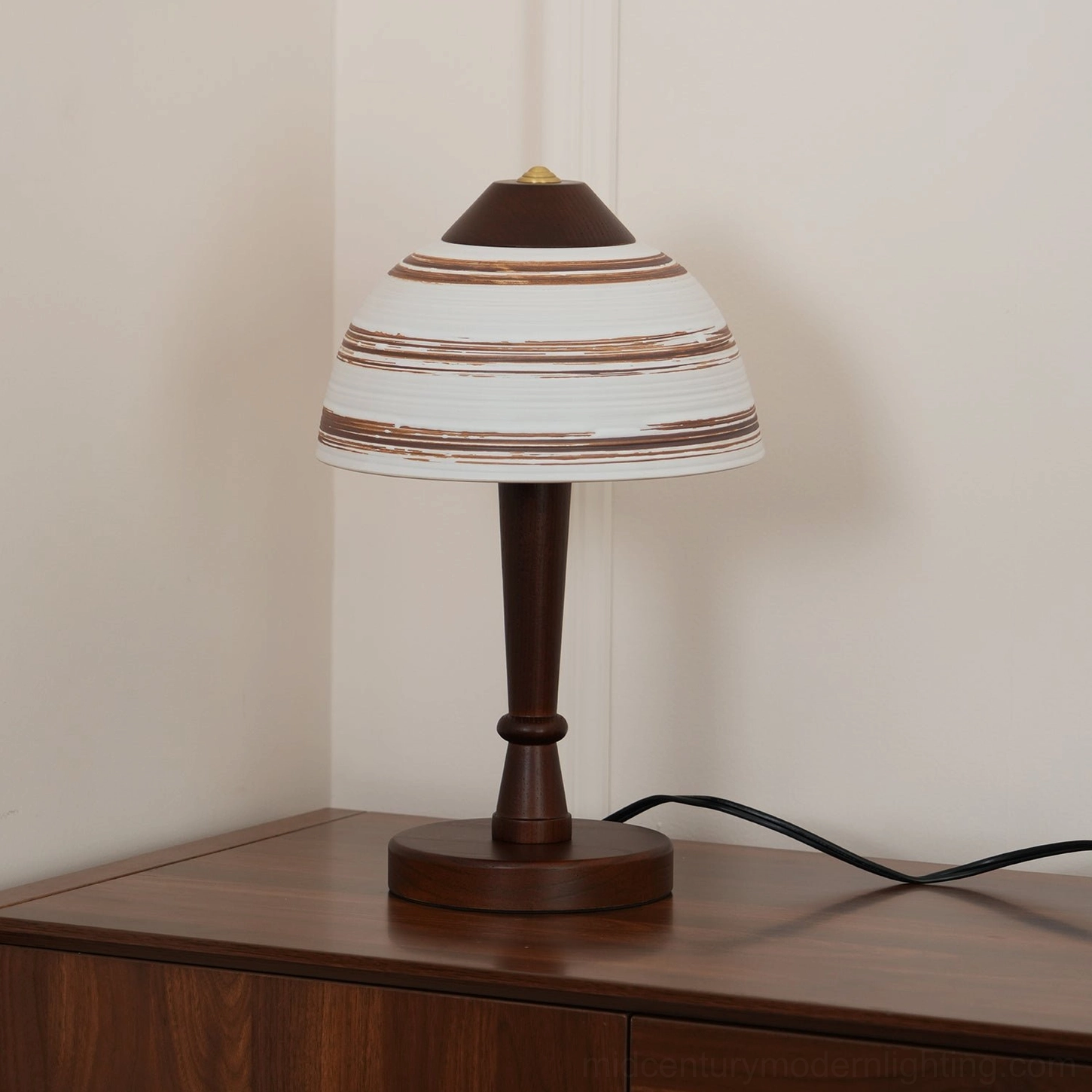 Athena retro mid-century table lamp three-quarter corner view minimalist walnut base and striped ceramic shade