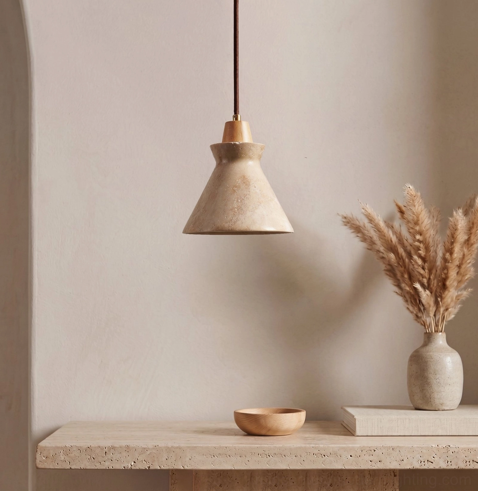 Athena travertine pendant light in minimalist entryway with dried floral decor and neutral tones