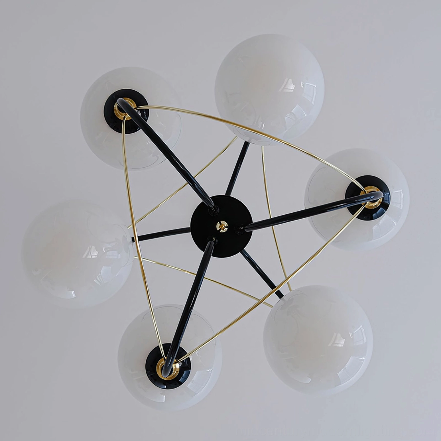 Overhead flat view of Atomic Orbit chandelier metal frame structure with six G9 lamp sockets on white background
