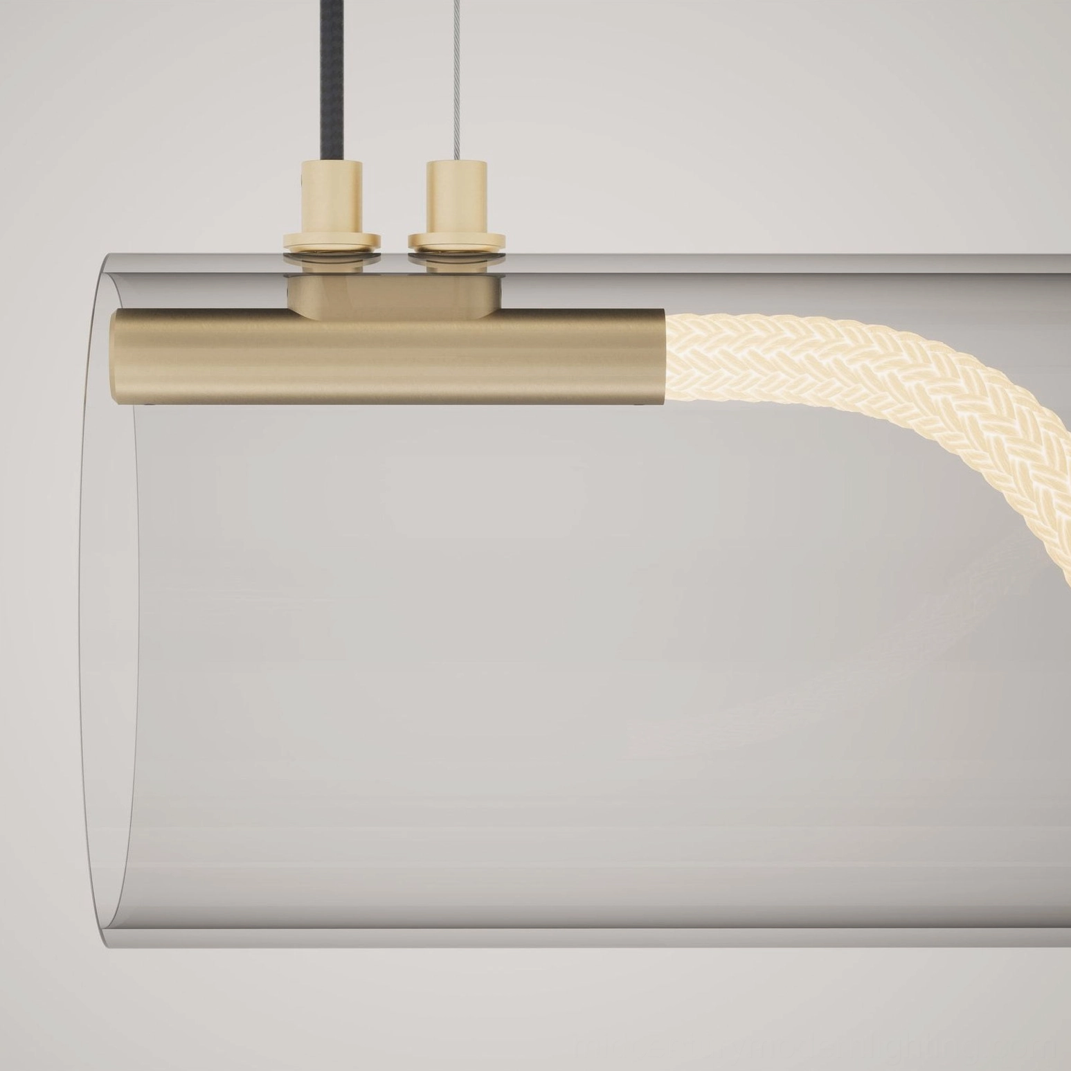 Close-up side view of Attalea linear pendant chandelier showing exposed braided LED strip and brass gold mounting hardware