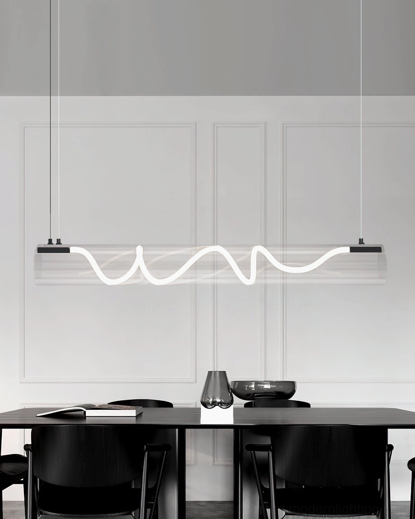 Attalea linear pendant chandelier frontal view above dark dining table in minimalist modern dining area