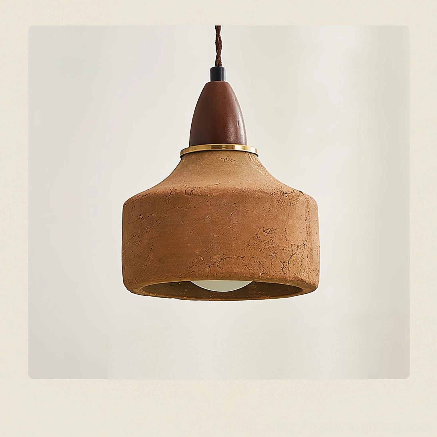 Auburn pendant light three-quarter bottom view showing open ceramic shade and internal bulb compatibility