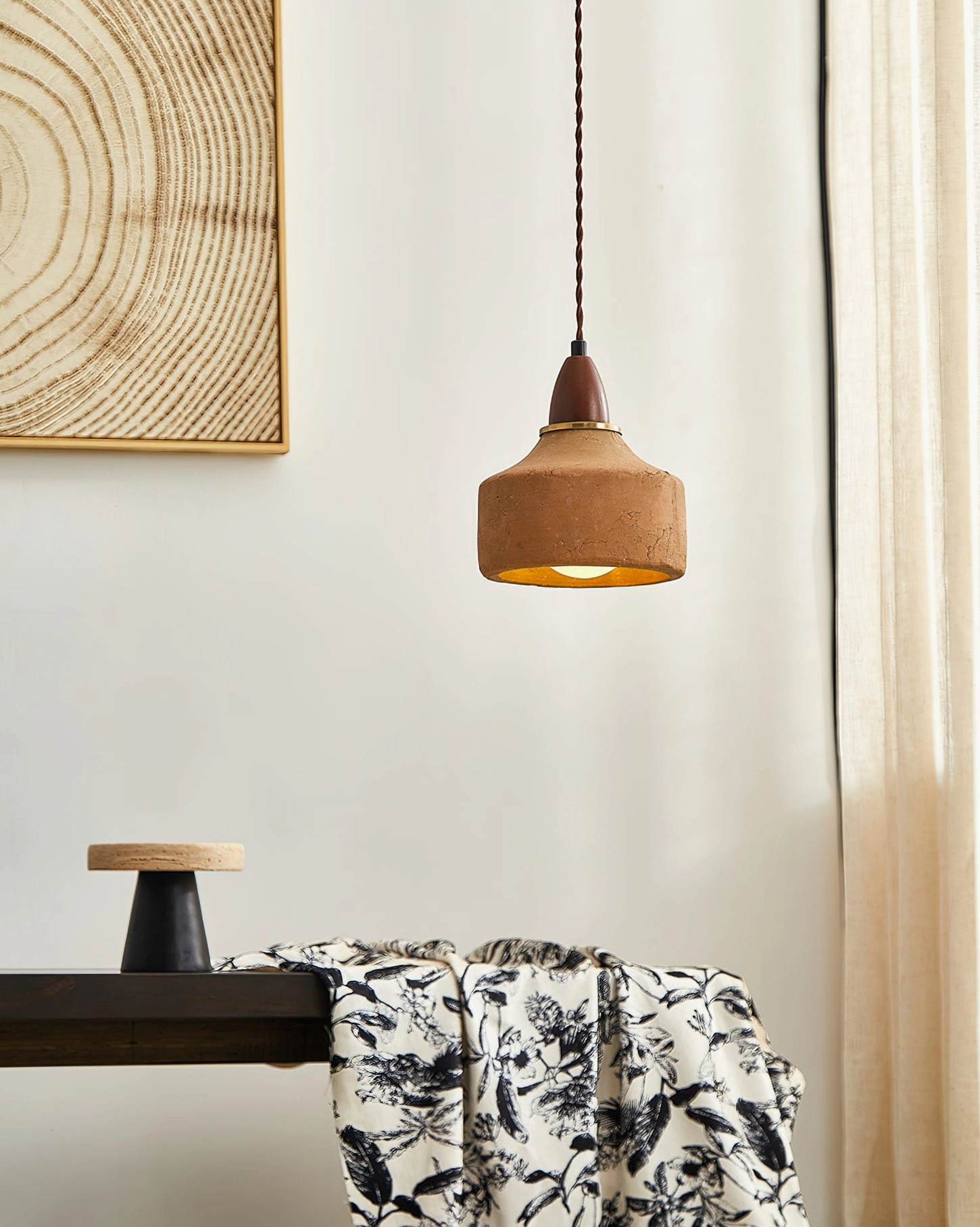 Auburn pendant light open bottom detail revealing G9 socket and warm illumination from inside