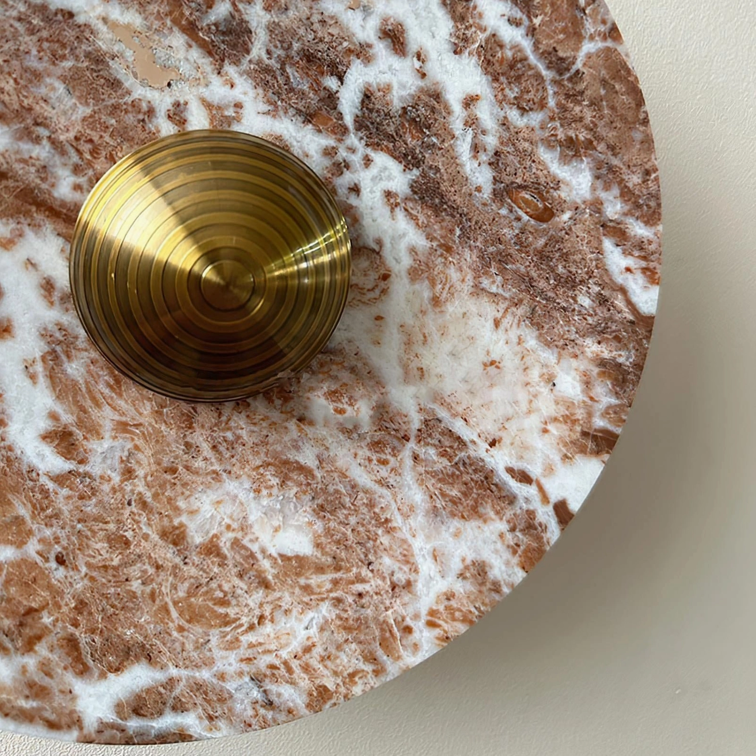 Brushed brass spiral knob detail on Aurora wall lamp showing vintage-modern hardware craftsmanship