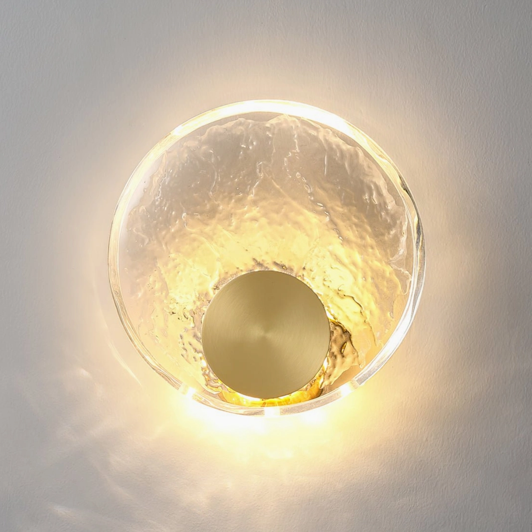 Premium brass wall sconce with integrated LED technology, geometric circular design for contemporary and modern interiors