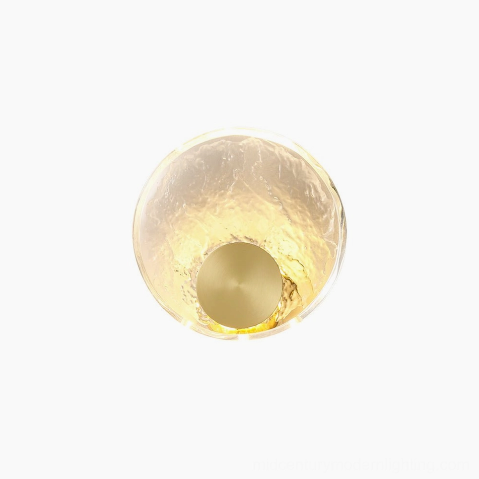 Aurum brass wall lamp with crystalline shade, minimalist mid-century modern design for bedroom and living spaces